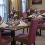 The elegant dining room at Crabwall Manor Hotel and Spa - the perfect venue for afternoon tea in Cheshire.