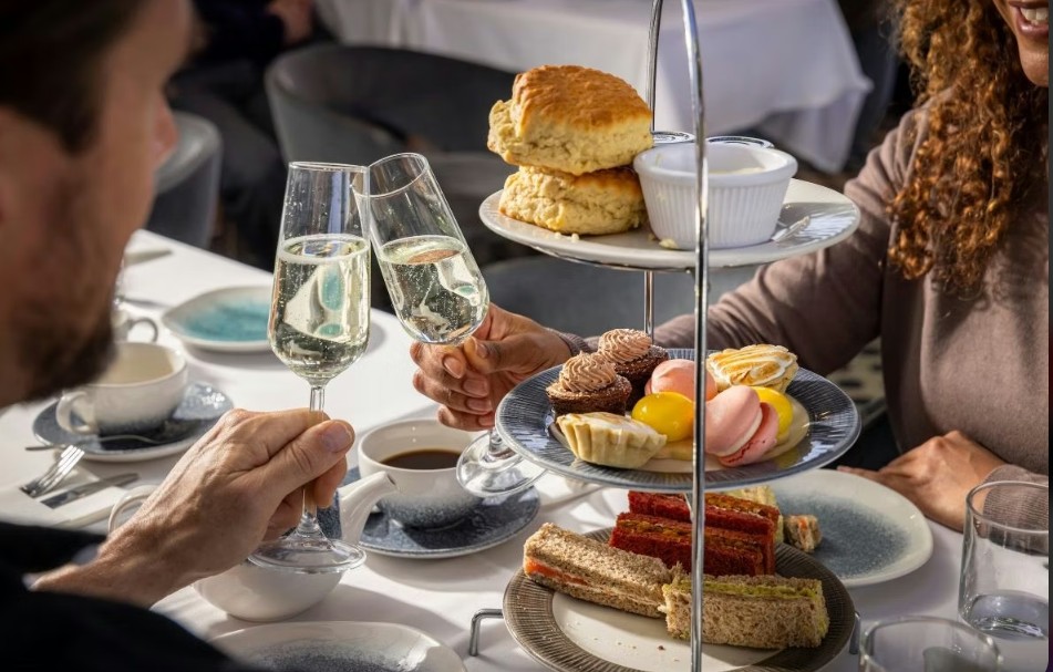 Thames river cruise with afternoon tea served at the Courthouse Hotel